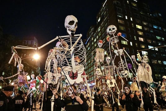 Halloween in the City Top Things to Do for Spooky Fun in NYC-The famous skeleton at NYC Halloween Parade. Photo by Dia Dipasupil/Getty Images